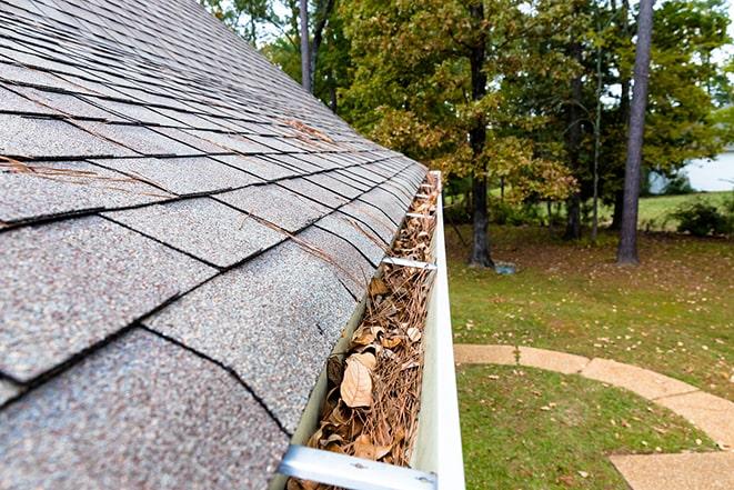 clean gutters and downspouts after maintenance